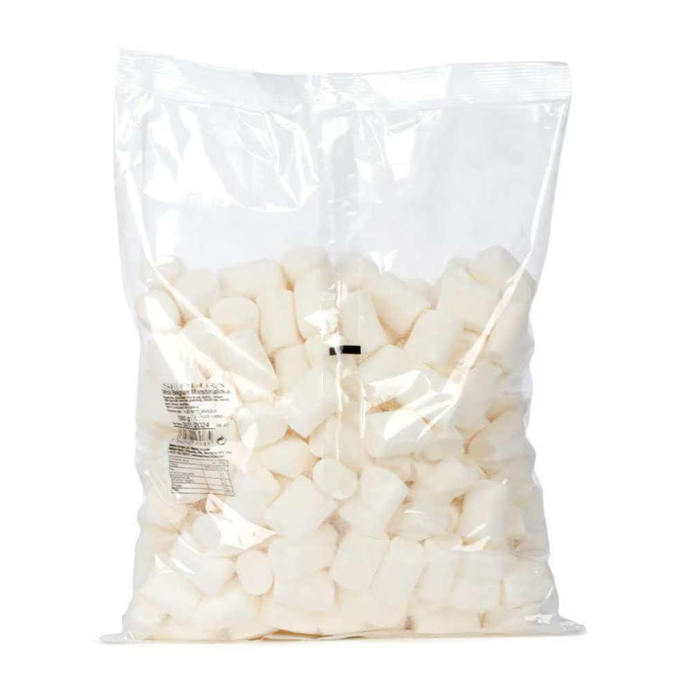 A clear plastic bag filled with white Sephra Belgian marshmallows, weighing 1 kilogram. The marshmallows are cylindrical and packed loosely inside the bag, with a printed label visible on the front.