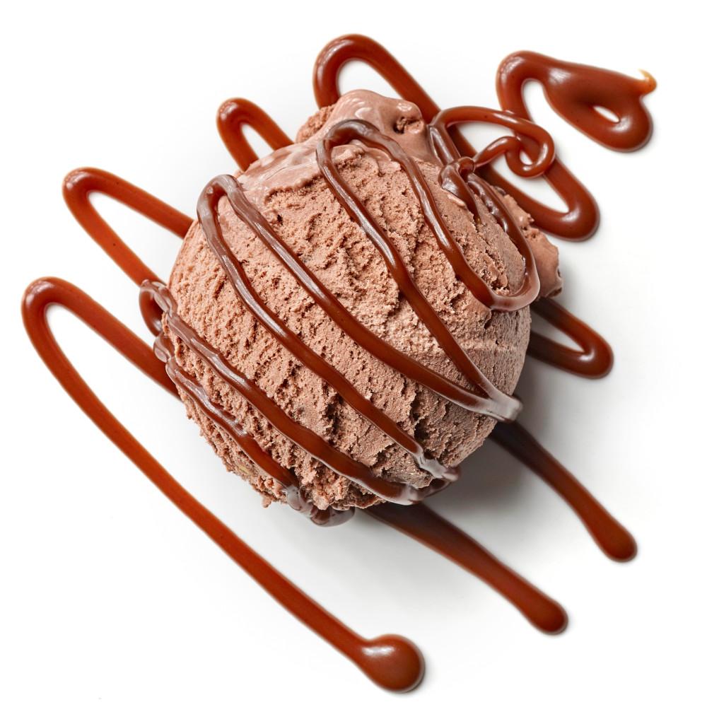 Scoop of chocolate ice cream drizzled with smooth chocolate hazelnut sauce – ideal topping for waffles, pancakes, and desserts