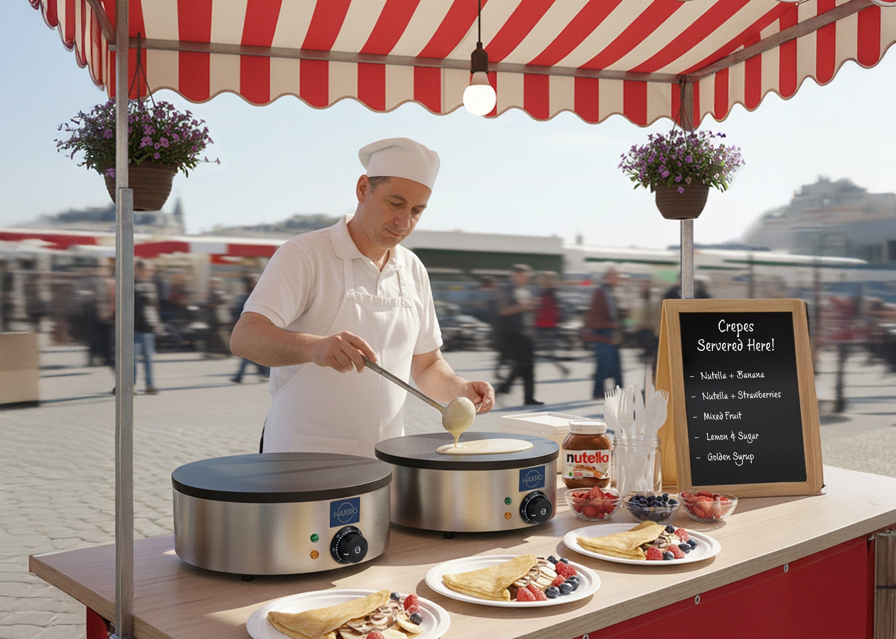 Man making crepes on crepe makers in a crepe stool