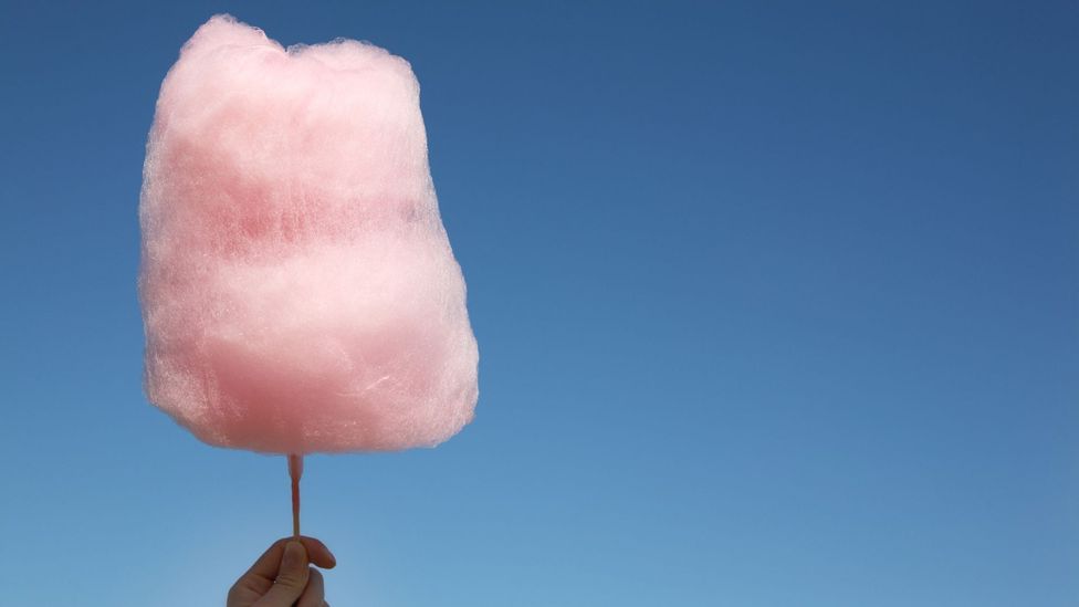 stick of candy floss against a blue sky