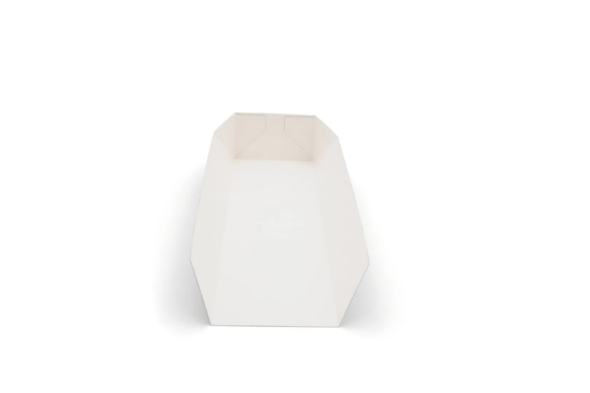 Front view of a white cardboard hot dog tray with an open top and tapered sides, showing the interior and folded corners.