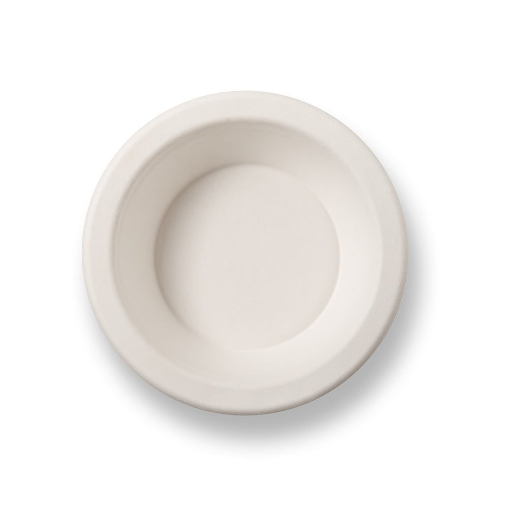 A plain, round white bowl viewed from above.