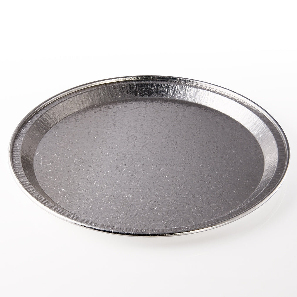 A round, metallic serving tray with a slightly raised edge and a smooth surface.