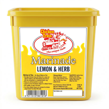 2kg yellow plastic tub of Chicken Train Lemon & Herb Marinade with flame design label, Chicken Train logo featuring a chicken on a train, bold “Marinade Lemon & Herb” text, ingredients and usage instructions, barcode, and Best Before box on the front.