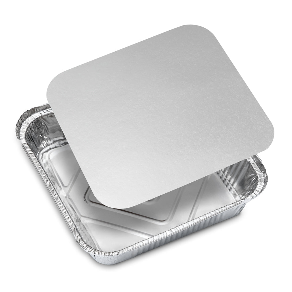 Disposable aluminum foil baking tray with a fitted silver lid, shown at an angle on a white background; clean, practical food packaging.