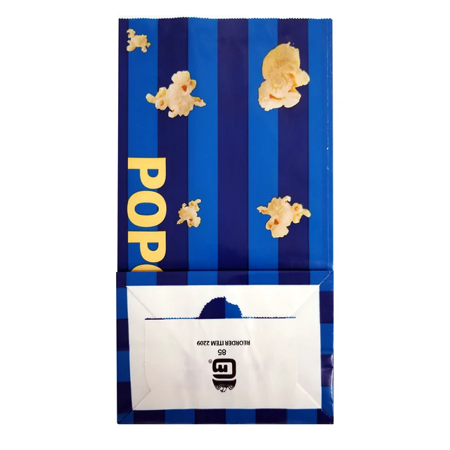 Unfolded blue and dark blue striped popcorn bag featuring yellow "POP" text and scattered white popcorn kernels, with the bottom flap showing reorder information.