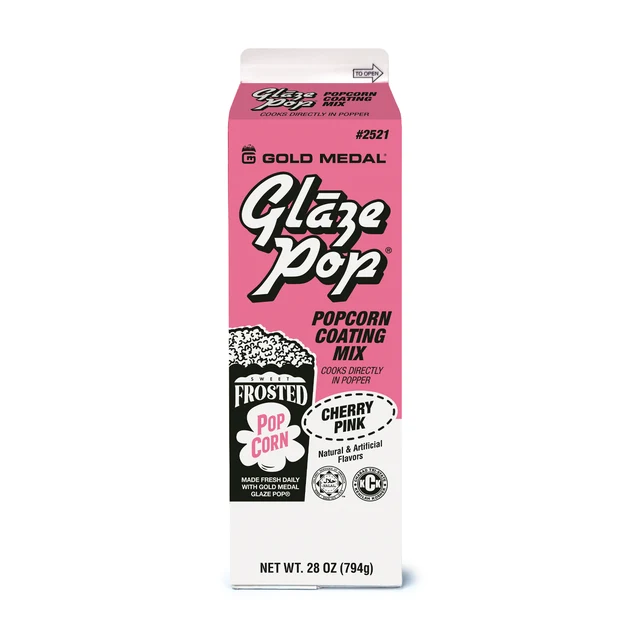 A tall pink-and-white Gold Medal Glaze Pop popcorn coating mix box, labeled “Cherry Pink” and “Frosted,” stands against a white background; the packaging feels bright and playful.