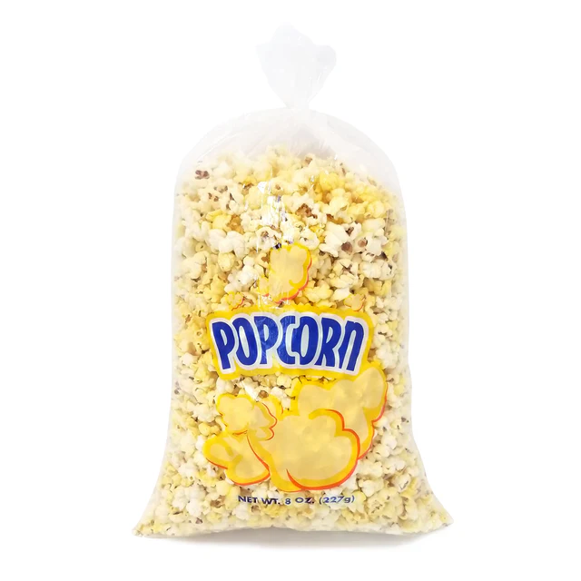 Clear plastic bag filled with buttery popcorn, labeled "Popcorn" in bold blue text. The background is plain white, emphasizing the product.