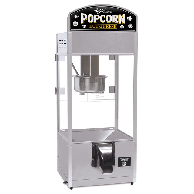 Silver popcorn machine with "Self Serve Popcorn: Hot & Fresh" sign. Features a clear display and dispensing unit below, conveying a vintage feel.