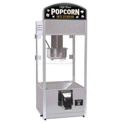 Silver popcorn machine with "Self Serve Popcorn: Hot & Fresh" sign. Features a clear display and dispensing unit below, conveying a vintage feel.