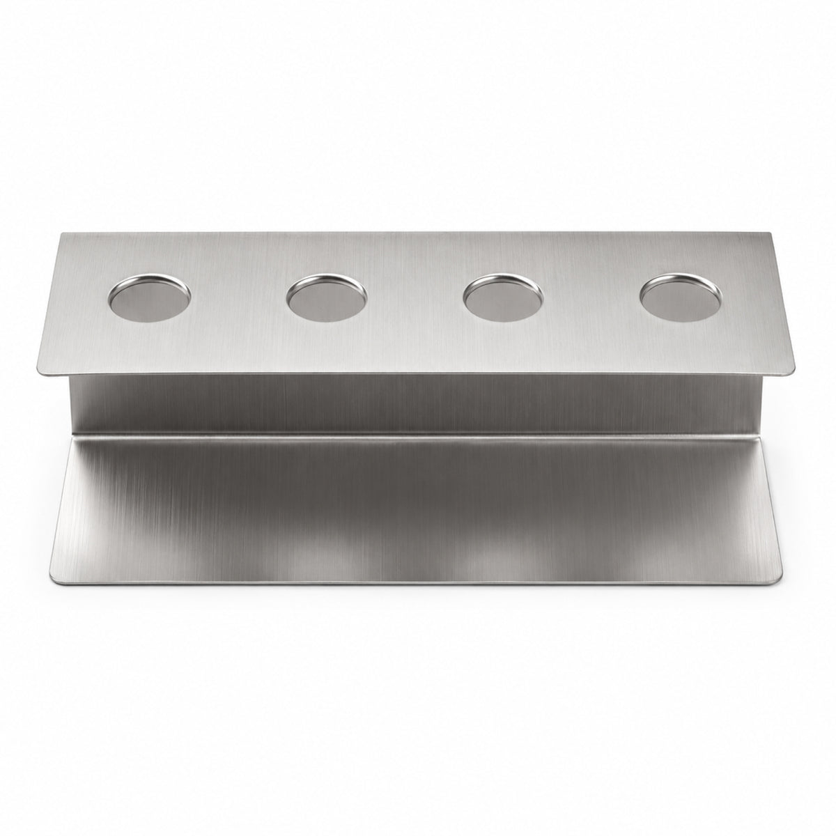 A stainless steel countertop condiment caddy with four circular sections.