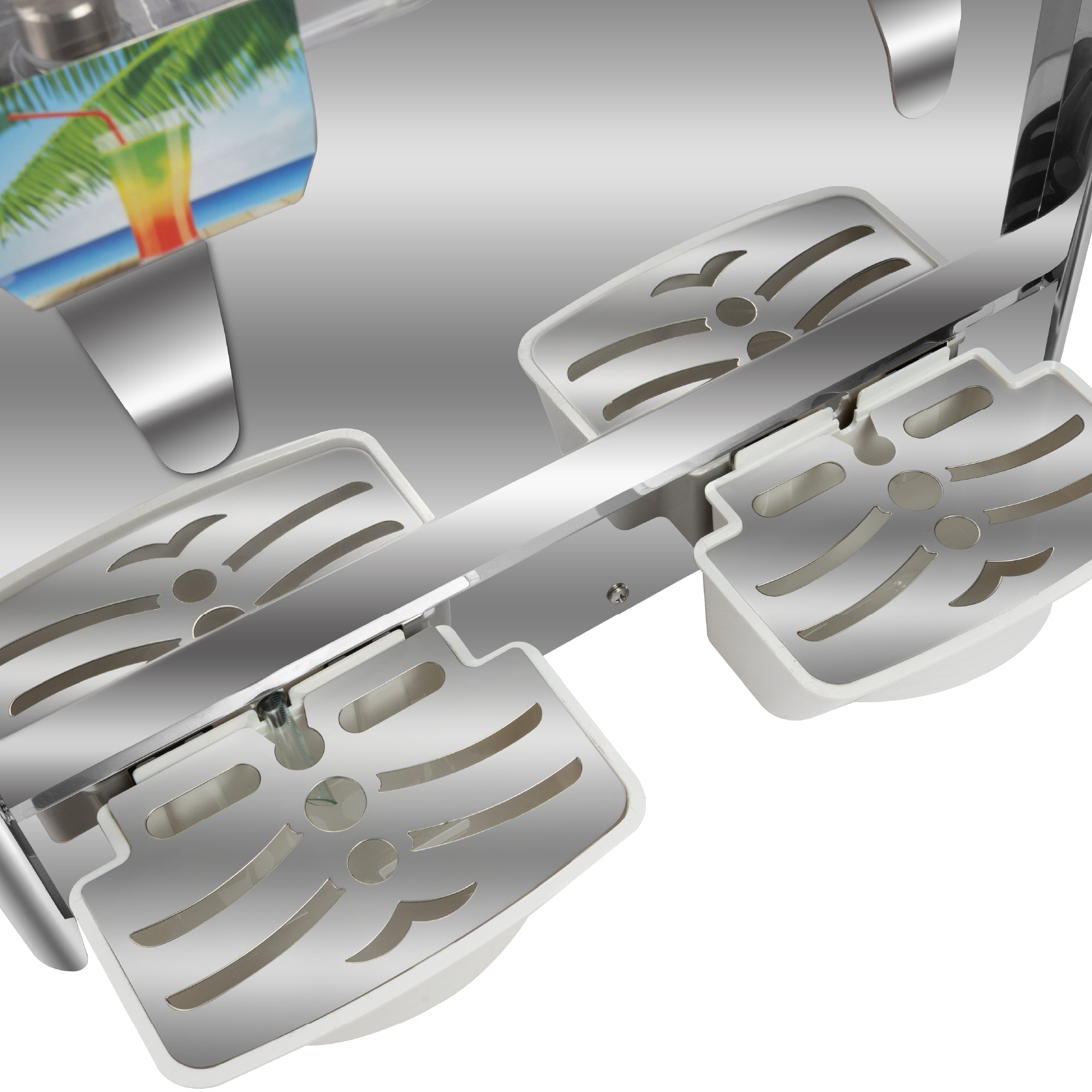 lose-up view of the drip trays and spouts of a stainless steel beverage dispenser, showing the metal grate design above white plastic drip trays.