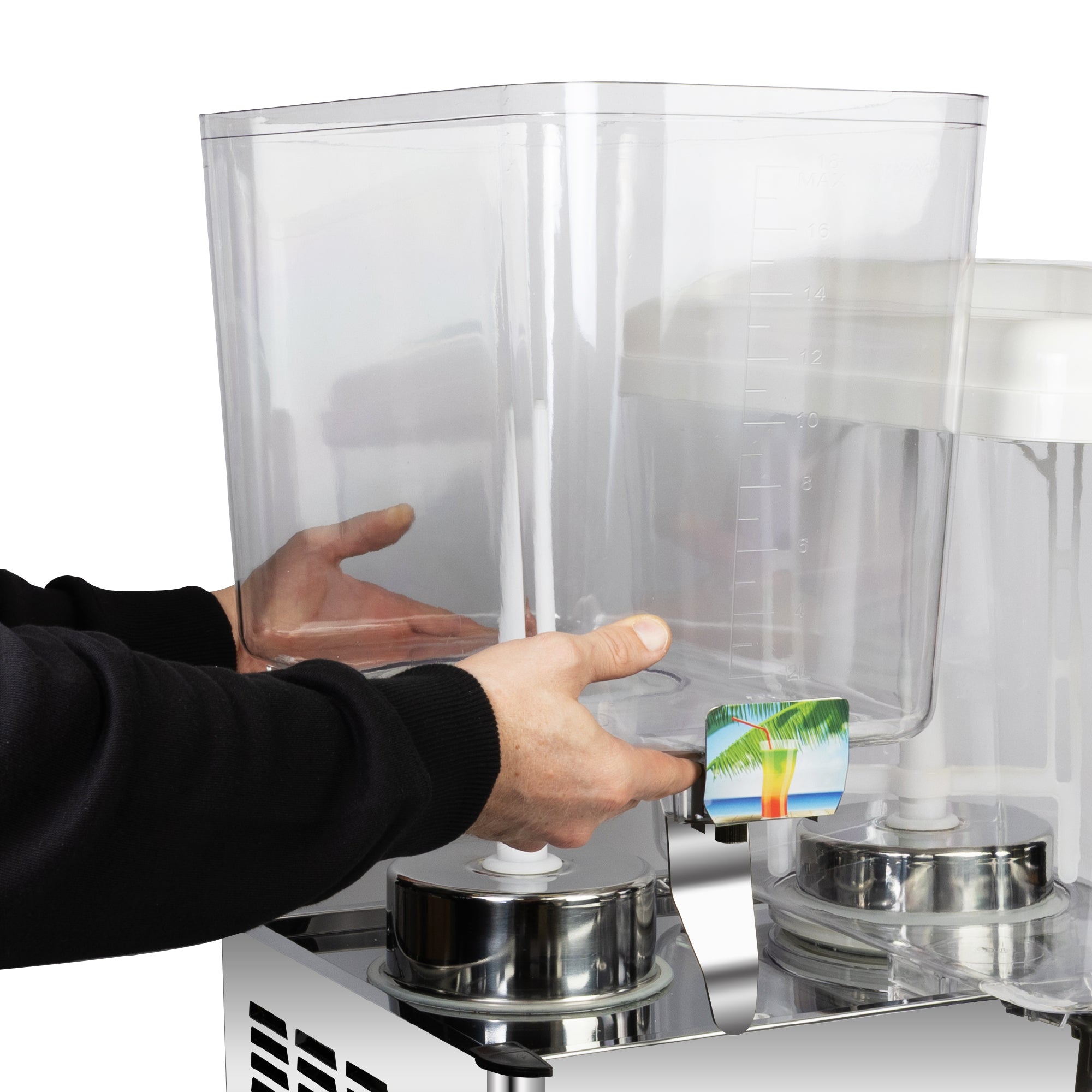 A person is lifting or placing a clear plastic beverage container onto a metal dispenser base.