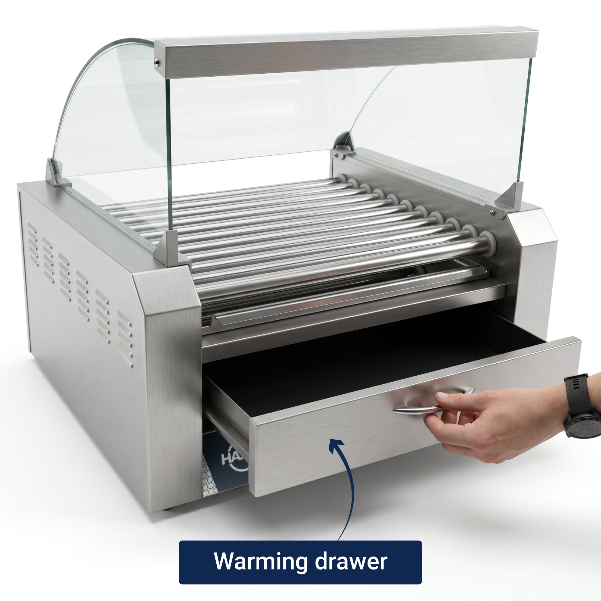 Hand opening the warming drawer of a stainless steel hot dog roller grill with a glass shield.