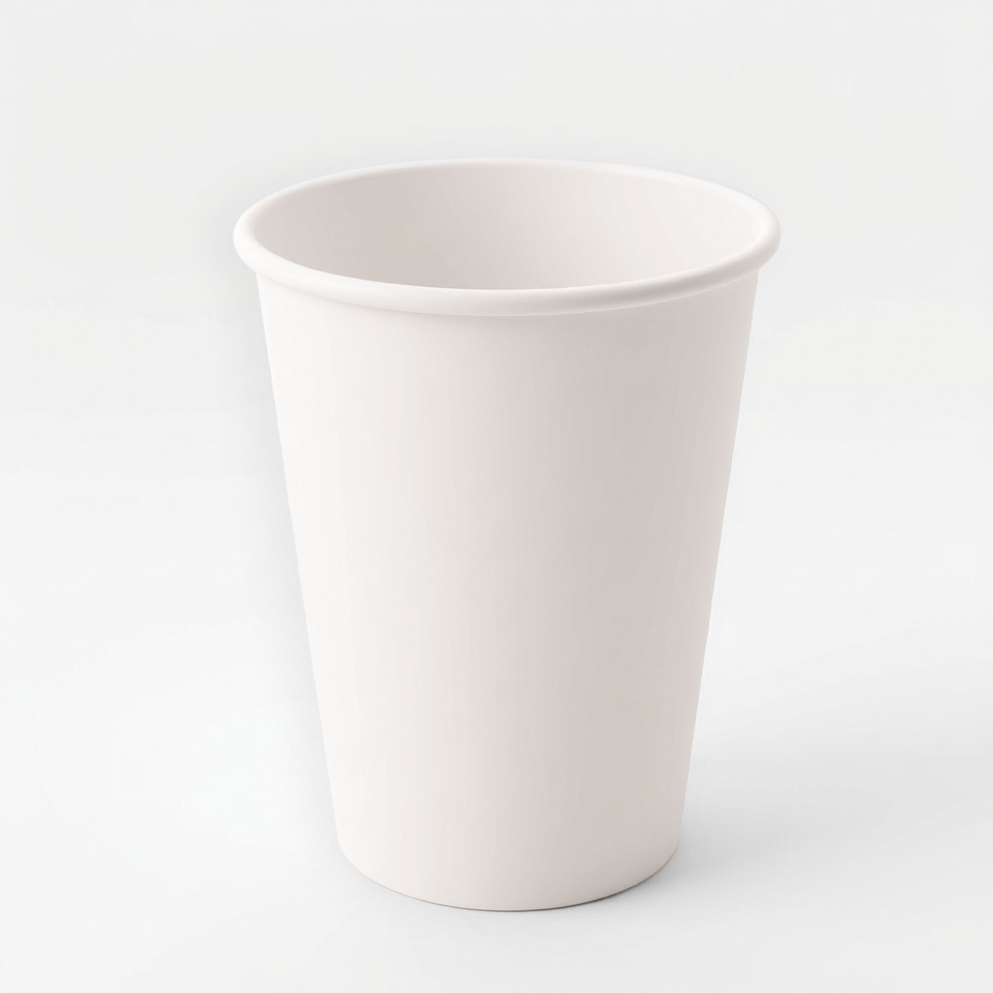 A plain, white paper cup is centered on a light gray background. The cup is tall and cylindrical, conveying simplicity and neutrality.