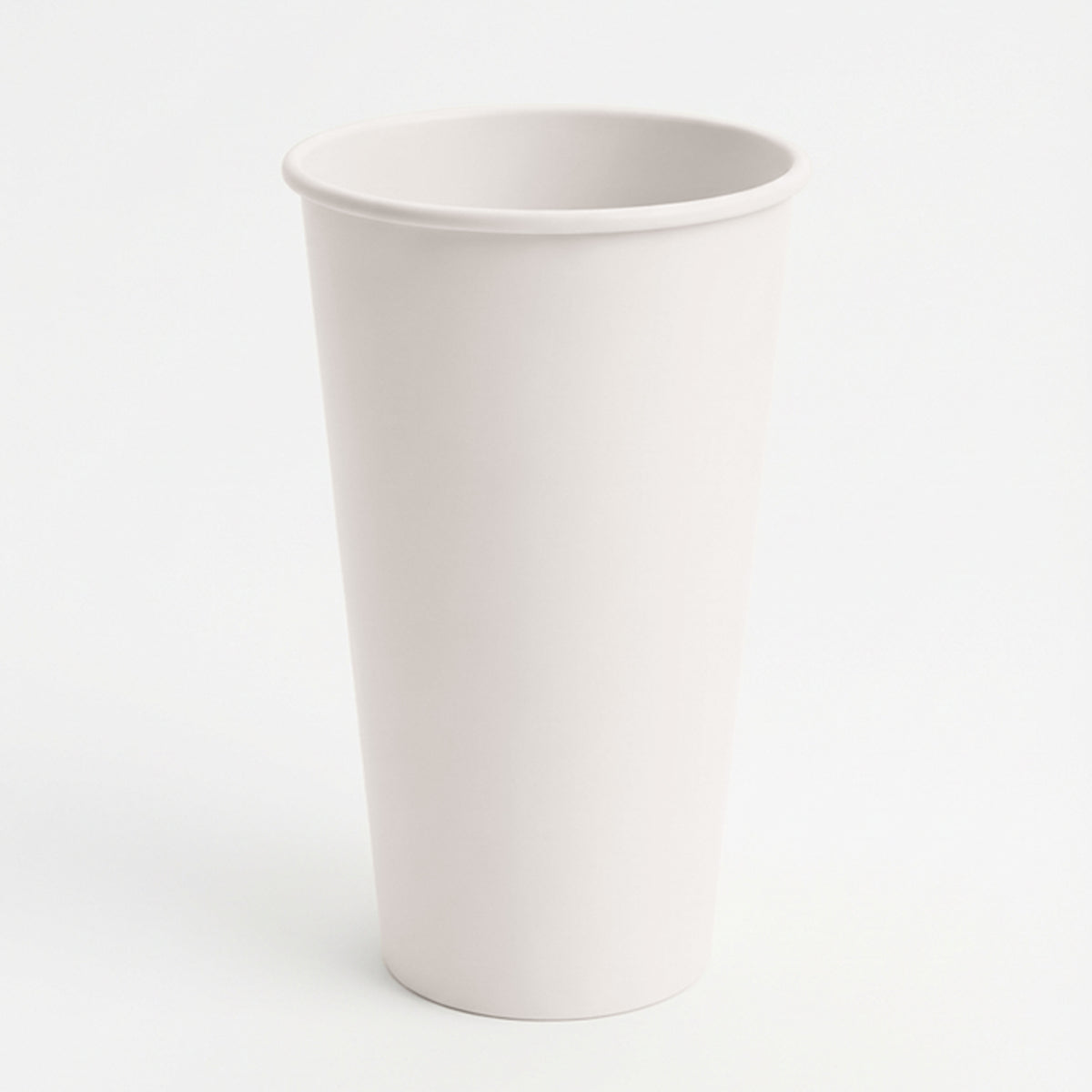A tall, plain, off-white ceramic cup is centered on a white background. The minimalist design conveys simplicity and elegance.
