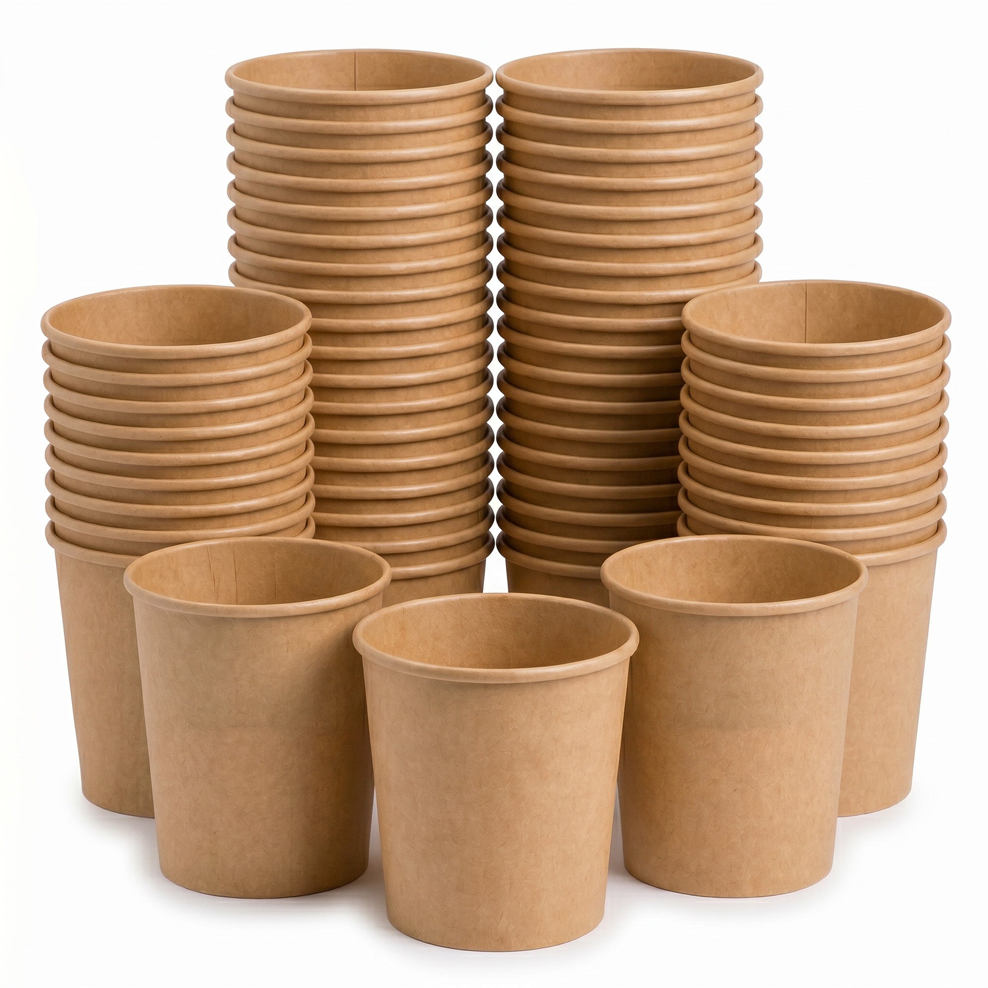 A variety of disposable brown paper cups stacked in different heights.
