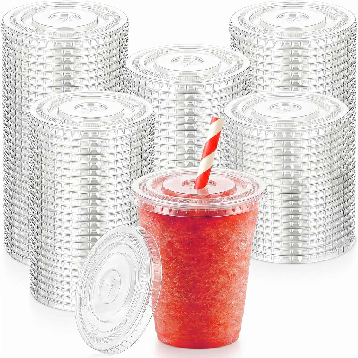Plastic lids stacked in columns form the background. In the foreground, a red icy drink in a clear cup with a red-and-white striped straw.