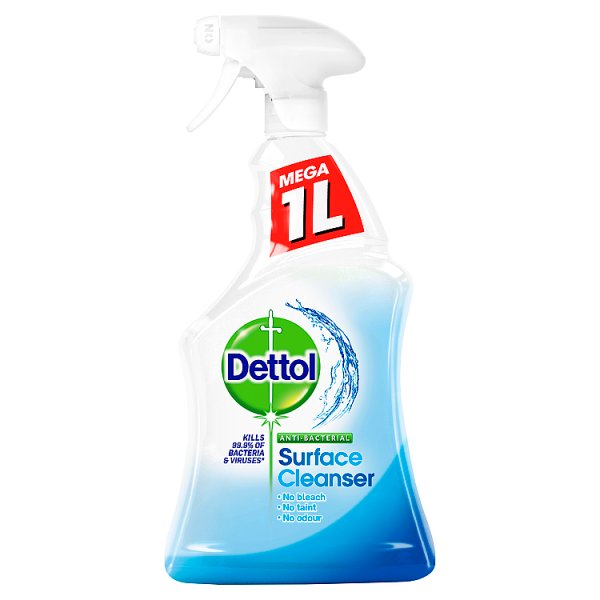 White Dettol 1-liter spray bottle of blue antibacterial surface cleanser, featuring a green cross logo and claims to kill bacteria and viruses.