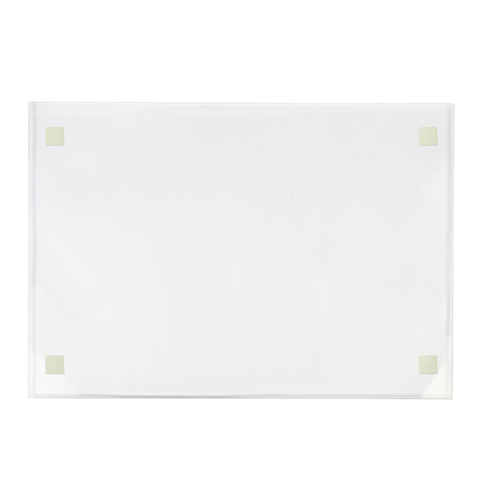 A clear rectangular glass board with rounded corners is shown against a white background. Four small, square adhesive pads are placed at each corner.