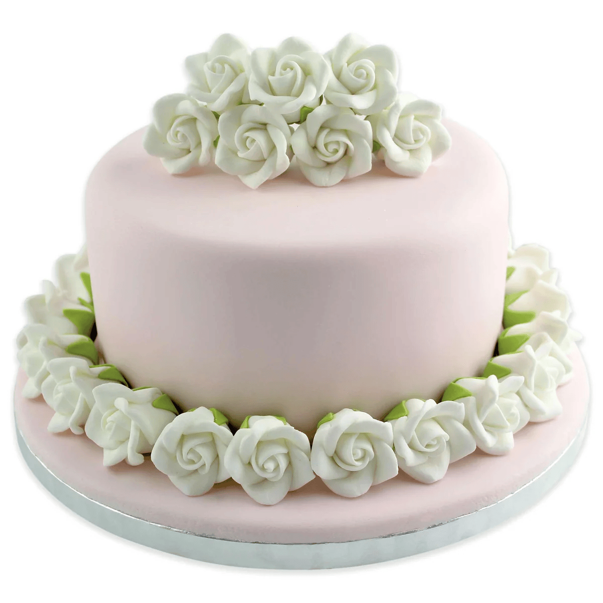 A round light pink cake decorated with white sugar roses around the top and base, shown on a white background.
