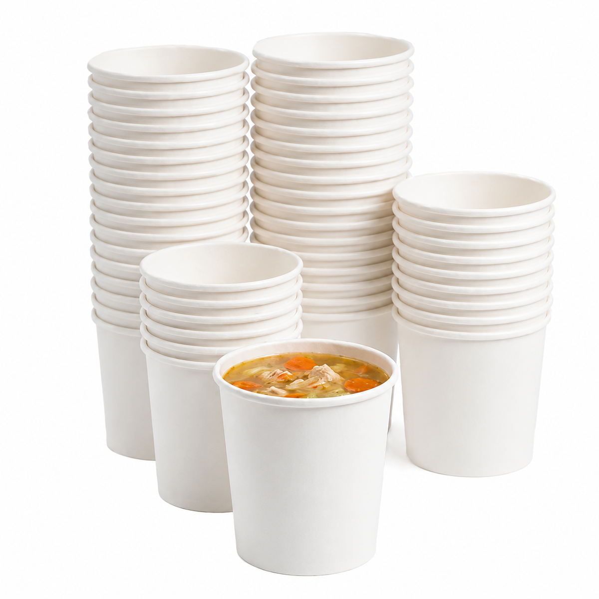Stacks of white paper cups with one containing soup on a white background