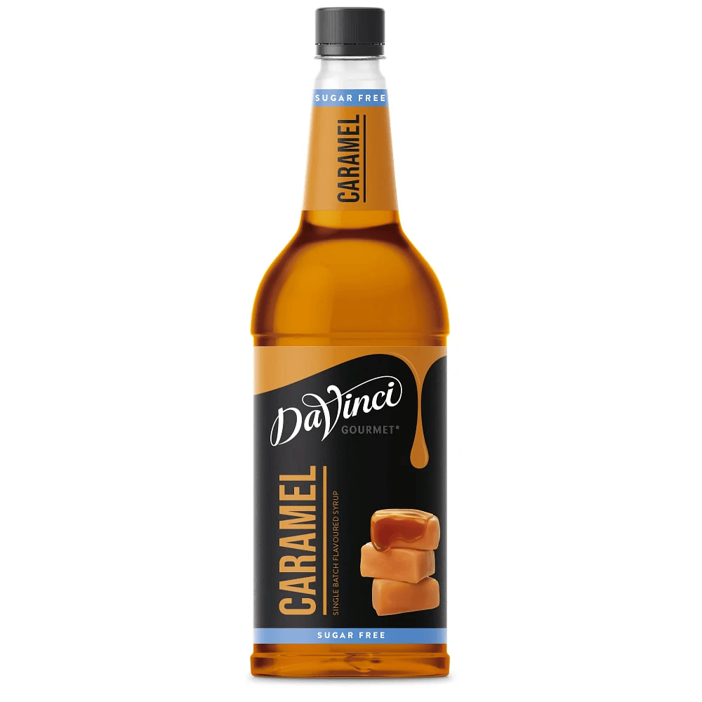 A bottle of DaVinci Gourmet sugar-free caramel syrup. The label features caramel illustrations and a black background with orange accents.