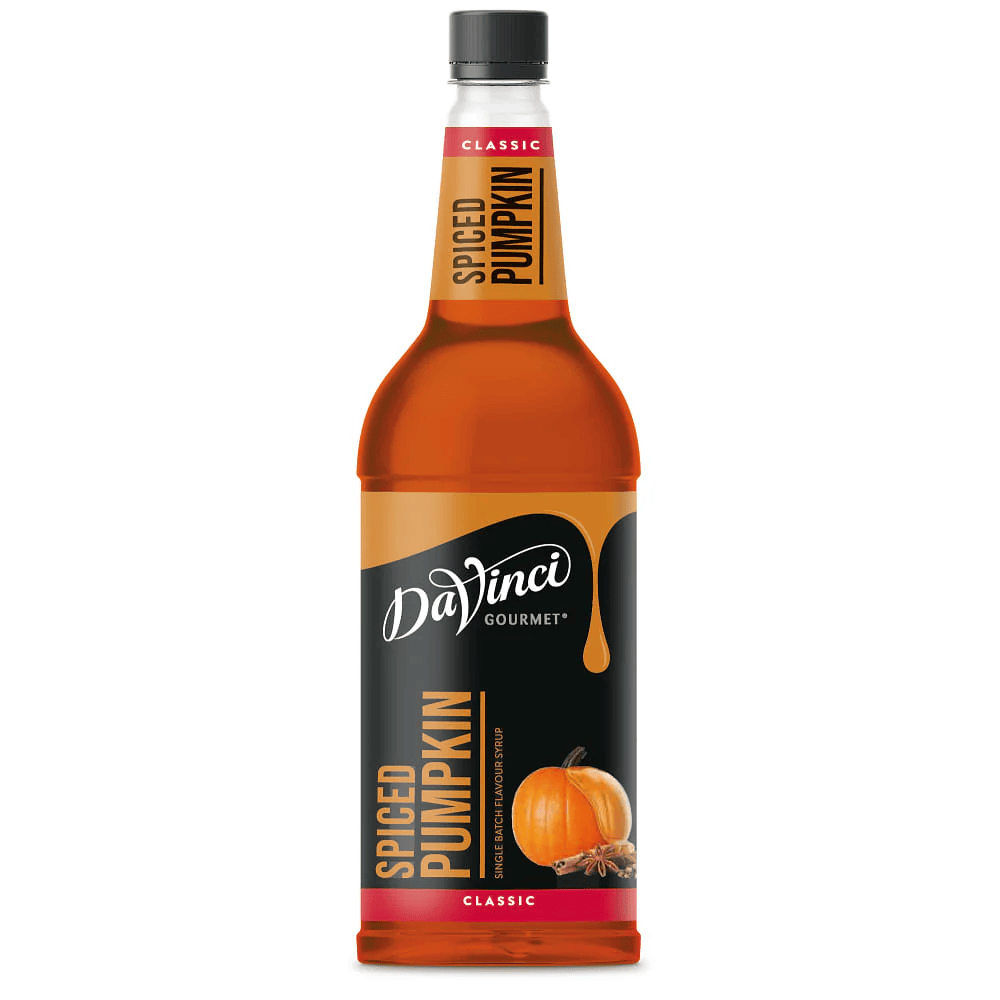 A bottle of DaVinci Gourmet Spiced Pumpkin syrup. The label features a pumpkin illustration and warm tones, evoking a cozy, autumn feel.