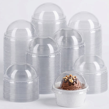Stacks of transparent plastic dome lids are seen, with one containing a chocolate ice cream topped with nuts and drizzle, creating a tempting focal point.