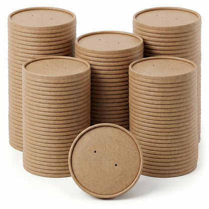 Stacks of brown, round, fiber lids are arranged in an orderly manner on a plain background. A single lid leans in front, displaying vent holes.
