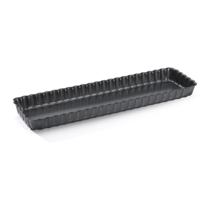 Rectangular black tart pan with fluted edges.