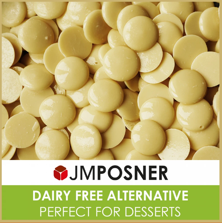 A bag of JM Posner’s vegan white chocolate buttons, labeled as dairy-free, gluten-free, soya-free, and made with Rainforest Alliance-certified chocolate.