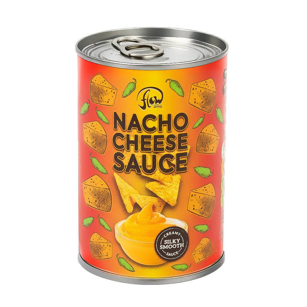 A can of nacho cheese sauce with an orange label featuring cheese blocks, green peppers, and tortilla chips. Text reads "Creamy, Silky Smooth Sauce."