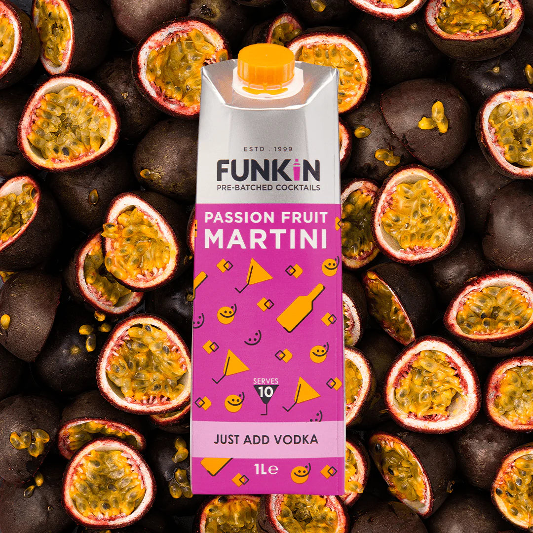 Bright, bold, and bursting with flavour

Experience a tropical twist with Funkin Passion Fruit Martini Mixer – a vibrant fusion of ripe Indian mango, tangy Ecuadorian passion fruit, and refreshing orange juice. Just add vodka or rum, shake well, strain over ice, and garnish with fresh passion fruit for a cocktail that tastes like paradise in a glass.
