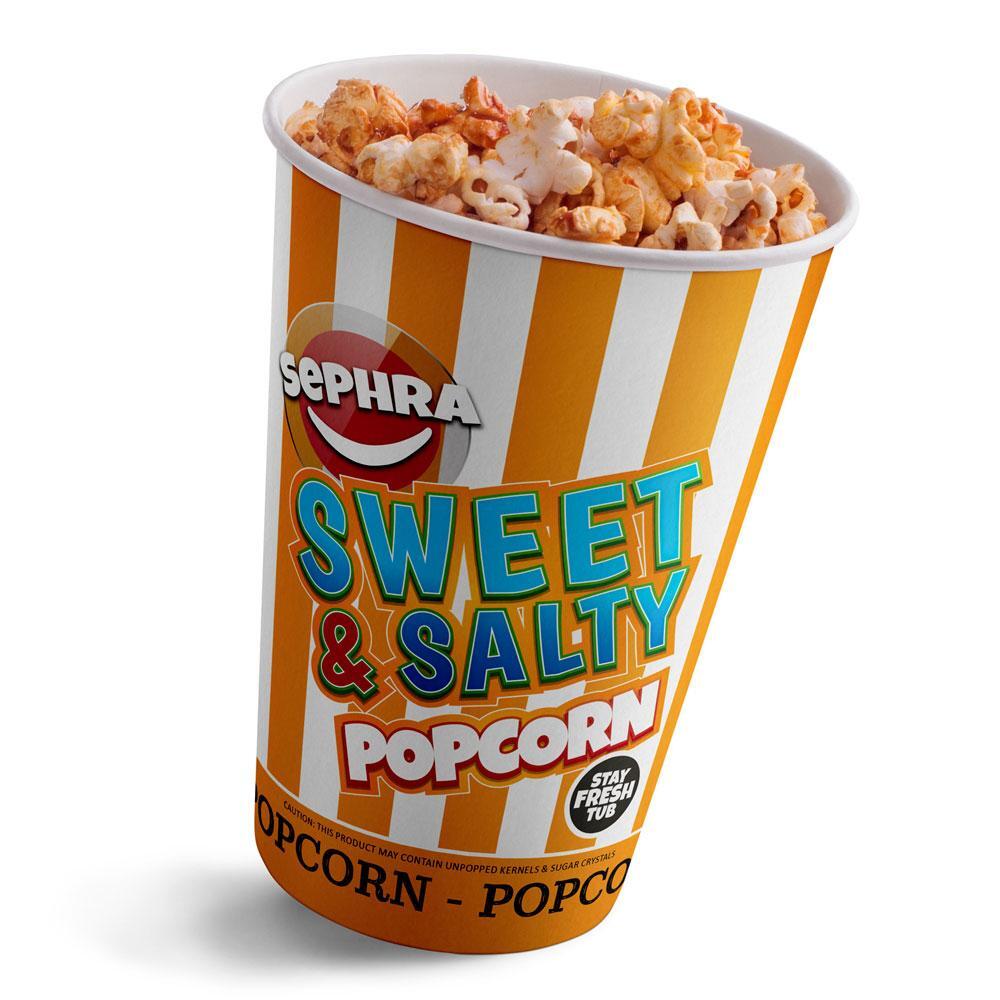 A striped orange and white tub filled with Sephra Sweet & Salty Popcorn.
