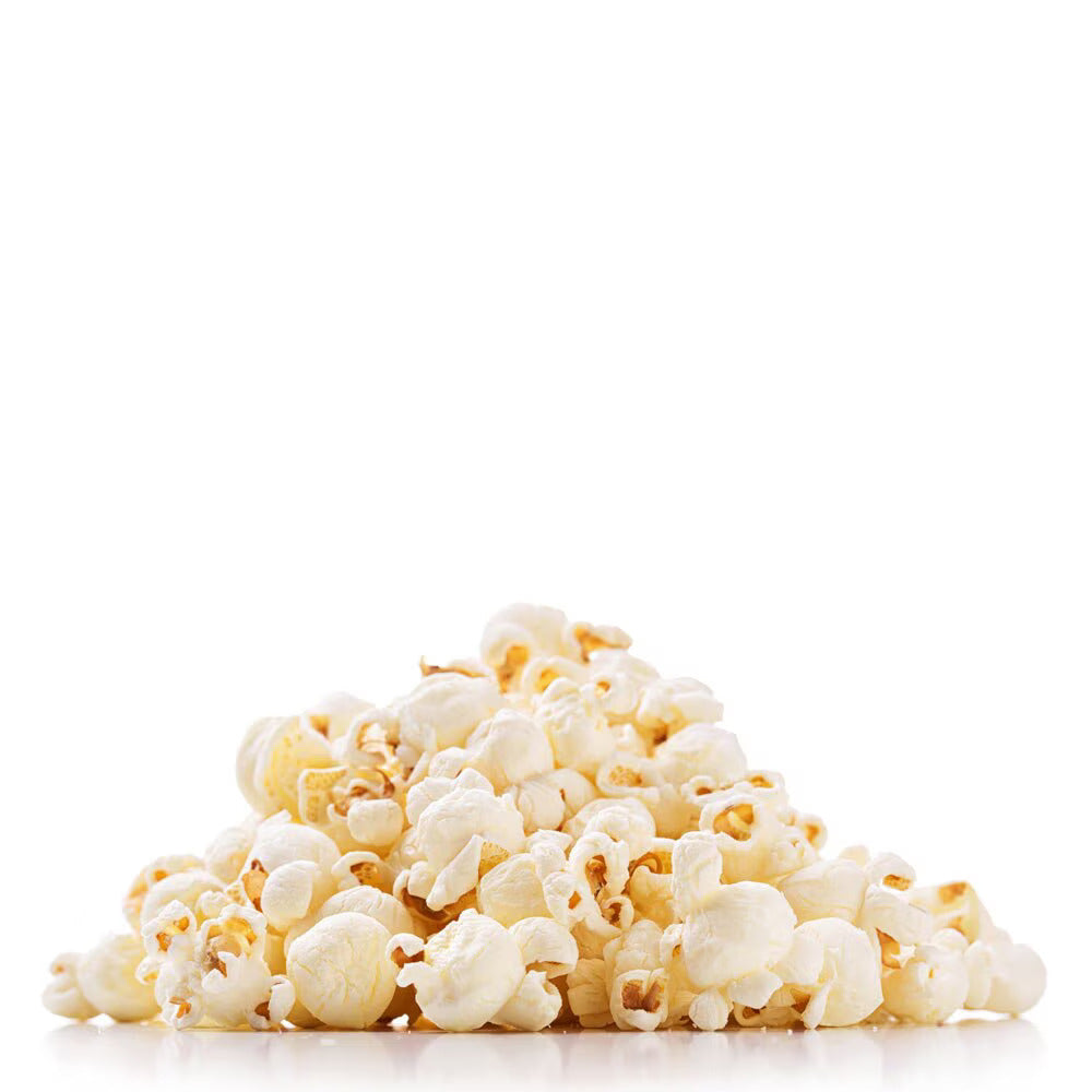 Pile of freshly popped, lightly buttered popcorn on a white background.