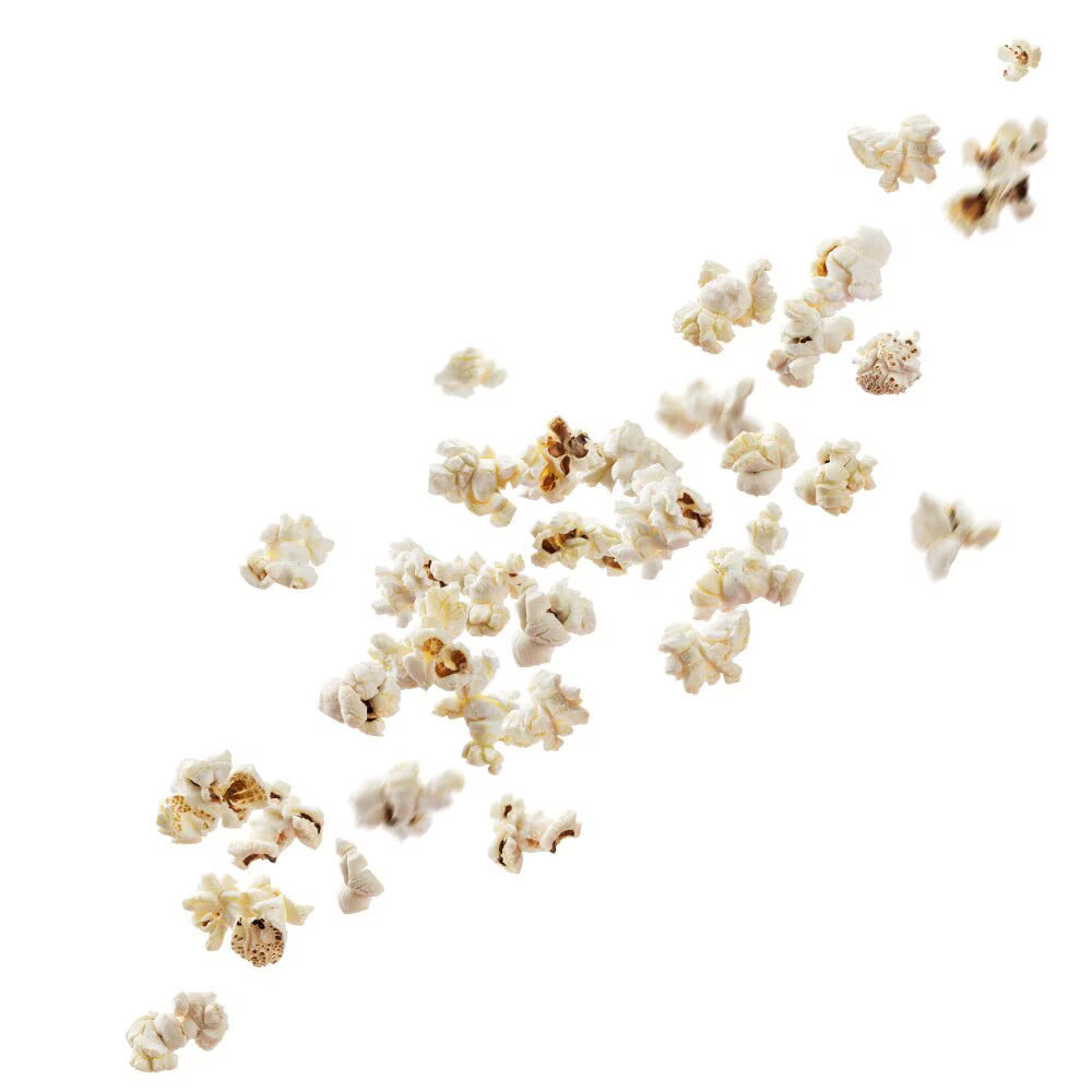 A scatter of popped popcorn pieces on a white background.