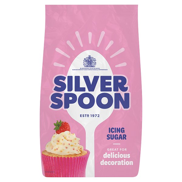 Pink bag of Silver Spoon British Icing Sugar (established 1972) featuring a large white spoon graphic and a cupcake topped with icing, labeled “Great for delicious decoration.