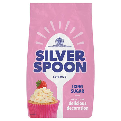 Pink bag of Silver Spoon British Icing Sugar (established 1972) featuring a large white spoon graphic and a cupcake topped with icing, labeled “Great for delicious decoration.