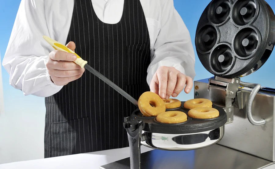 Cialderia Donuts machine by Techfood, a stainless steel countertop donut maker with digital timer and non-stick Teflon plate, ideal for bars, hotels, and pastry shops to serve fresh, smoke-free donuts.