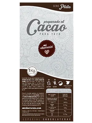 Packet of “Serie Plata” hot chocolate cocoa mix, featuring an ornamental grey design, a “mi chocolatería” seal and a nutritional information table on the lower section.