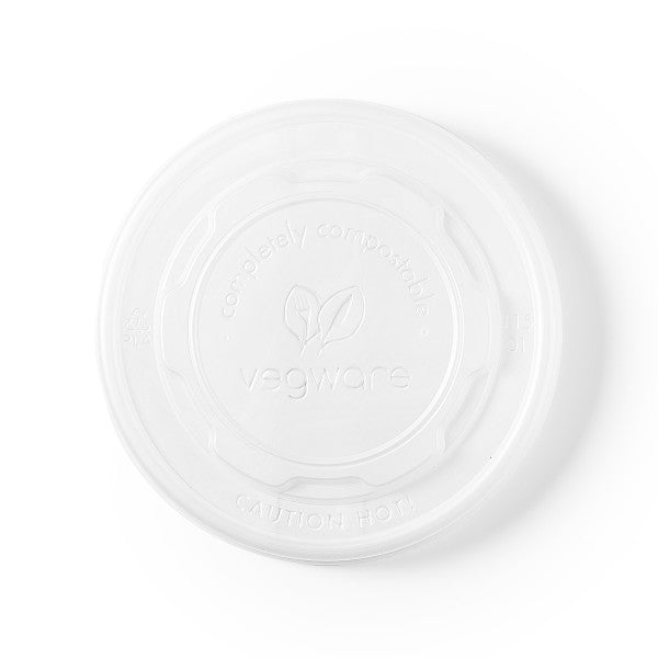 White ceramic plate with textured design on a white background